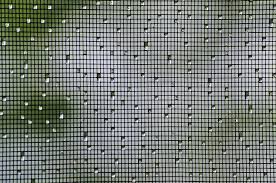 Qué es una mosquitera de puerta abatible